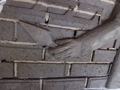 Rough Masonry woman hand